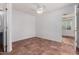 Bright bedroom with tiled floors and ceiling fan at 4728 E Mulberry Dr, Phoenix, AZ 85018