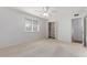 Well-lit bedroom with a large window and closet at 4728 E Mulberry Dr, Phoenix, AZ 85018