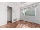 Spacious bedroom with tiled floors and ceiling fan at 4728 E Mulberry Dr, Phoenix, AZ 85018