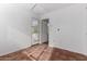 Bedroom with tiled floors and French doors leading to the pool at 4728 E Mulberry Dr, Phoenix, AZ 85018