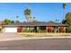 Brick house with a two-car garage and manicured lawn at 4728 E Mulberry Dr, Phoenix, AZ 85018