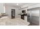 Eat-in kitchen, granite countertops and stainless steel appliances at 4728 E Mulberry Dr, Phoenix, AZ 85018