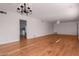 Living room with hardwood floors and chandelier at 4728 E Mulberry Dr, Phoenix, AZ 85018