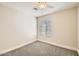 Well-lit bedroom featuring neutral walls and carpet flooring at 4737 N 9Th St, Phoenix, AZ 85014