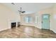 Living room with a fireplace and light teal door at 4737 N 9Th St, Phoenix, AZ 85014