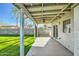 Covered patio with ceiling fan and access to backyard at 4737 N 9Th St, Phoenix, AZ 85014