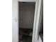 The closet's damaged walls and flooring suggest disrepair and neglect in this storage space at 504 W Baseline Rd, Buckeye, AZ 85326