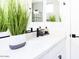 Stylish bathroom featuring a white vanity with black accents at 5918 E Tina Dr, Phoenix, AZ 85054