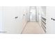 Spacious walk-in closet with ample storage shelving and hanging space at 5918 E Tina Dr, Phoenix, AZ 85054