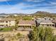 Aerial view of house and neighborhood, highlighting the mountain views at 5927 E Sienna Bouquet Pl, Cave Creek, AZ 85331