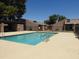 Community swimming pool with ample deck space at 629 N Mesa Dr # 29, Mesa, AZ 85201