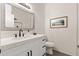 Clean and modern bathroom with a white vanity and a large mirror at 6309 N 14Th St, Phoenix, AZ 85014