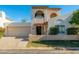 Two-story home with attached garage and Spanish-style architecture at 6309 N 14Th St, Phoenix, AZ 85014