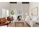 Cozy living room featuring a fireplace and wood beam accents at 6309 N 14Th St, Phoenix, AZ 85014