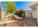 Relaxing patio area with brick pavers and lounge chairs at 6309 N 14Th St, Phoenix, AZ 85014