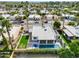 Aerial view of house, pool, and surrounding neighborhood at 7730 E Buena Terra Way, Scottsdale, AZ 85250