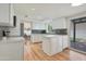 Modern kitchen with white cabinets, quartz countertops, and island at 7730 E Buena Terra Way, Scottsdale, AZ 85250