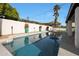 Relaxing pool area with patio furniture and string lights at 7730 E Buena Terra Way, Scottsdale, AZ 85250