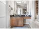 Modern bathroom with vanity, large mirror and tiled floor at 8 Biltmore Est # 123, Phoenix, AZ 85016