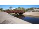 Footbridge over canal, serene community feature at 8 Biltmore Est # 123, Phoenix, AZ 85016