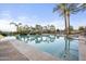 Inviting swimming pool with palm trees and lounge chairs at 8 Biltmore Est # 123, Phoenix, AZ 85016