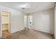 Spacious bedroom with closet and view into another room at 8131 N 107Th Ave # 81, Peoria, AZ 85345