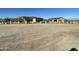 Large desert lot with a two-story house and detached garage at 8210 S 132Nd Ave, Goodyear, AZ 85338