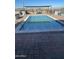 Rectangular pool with brick decking and covered patio at 8210 S 132Nd Ave, Goodyear, AZ 85338