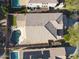 Aerial view of a house with a pool and a backyard in a residential area at 9017 W Pinnacle Vista Dr, Peoria, AZ 85383