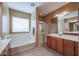 Elegant bathroom with double sinks, soaking tub, and shower at 9017 W Pinnacle Vista Dr, Peoria, AZ 85383