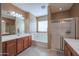 Bathroom with double vanity, shower, and bathtub at 9017 W Pinnacle Vista Dr, Peoria, AZ 85383