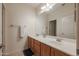 Double vanity bathroom with a large mirror at 9017 W Pinnacle Vista Dr, Peoria, AZ 85383