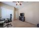 Home office in bedroom with built-in fireplace at 9017 W Pinnacle Vista Dr, Peoria, AZ 85383