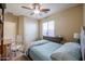 Bright bedroom with a ceiling fan and large closet at 9017 W Pinnacle Vista Dr, Peoria, AZ 85383