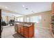 Kitchen with island, breakfast bar, and open layout to Gathering room at 9017 W Pinnacle Vista Dr, Peoria, AZ 85383