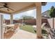 Relaxing patio with seating area and pool view at 9017 W Pinnacle Vista Dr, Peoria, AZ 85383