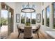 Bright dining room with hardwood floors and a chandelier at 9111 E Mountain Spring Rd, Scottsdale, AZ 85255