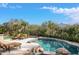 Inviting pool and spa with mountain backdrop at 9111 E Mountain Spring Rd, Scottsdale, AZ 85255