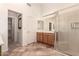 Bathroom with double sinks, large shower, and tile flooring at 9312 E Arrowvale Dr, Sun Lakes, AZ 85248