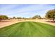 Golf course with sand traps and manicured greens at 9312 E Arrowvale Dr, Sun Lakes, AZ 85248