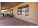 Covered patio with brick pavers and seating area at 9312 E Arrowvale Dr, Sun Lakes, AZ 85248