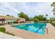 Community pool with lounge chairs at 9312 E Arrowvale Dr, Sun Lakes, AZ 85248