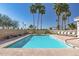 Community pool with lounge chairs at 9312 E Arrowvale Dr, Sun Lakes, AZ 85248