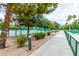 Pathway alongside tennis courts at 9312 E Arrowvale Dr, Sun Lakes, AZ 85248