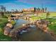 Eastmark community features a tranquil pond and modern clubhouse at 9408 E Supernova Dr, Mesa, AZ 85212