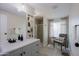 Updated bathroom with gray vanity, floating shelves, and a walk-in shower at 9501 E Broadway Rd # 140, Mesa, AZ 85208