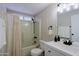 Clean bathroom with a bathtub, shower, and white vanity at 9501 E Broadway Rd # 140, Mesa, AZ 85208