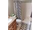 Clean bathroom with shower/tub combo and granite vanity at 10728 W Irma Ln, Sun City, AZ 85373
