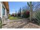 Landscaped backyard, featuring a grill and a cactus at 10929 E North Ln, Scottsdale, AZ 85259