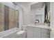 Clean bathroom with a large mirror and a bathtub at 10929 E North Ln, Scottsdale, AZ 85259